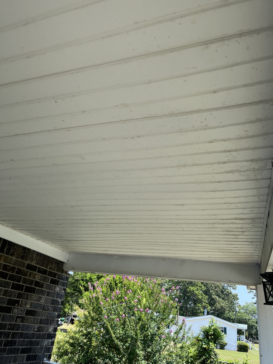 Dirty porch ceiling before washing